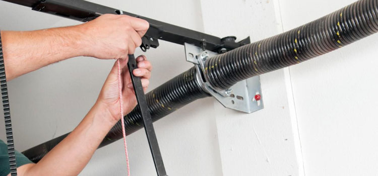 Signs of Garage Door Damaged Springs in Cable